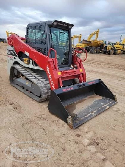 Used Takeuchi in yard